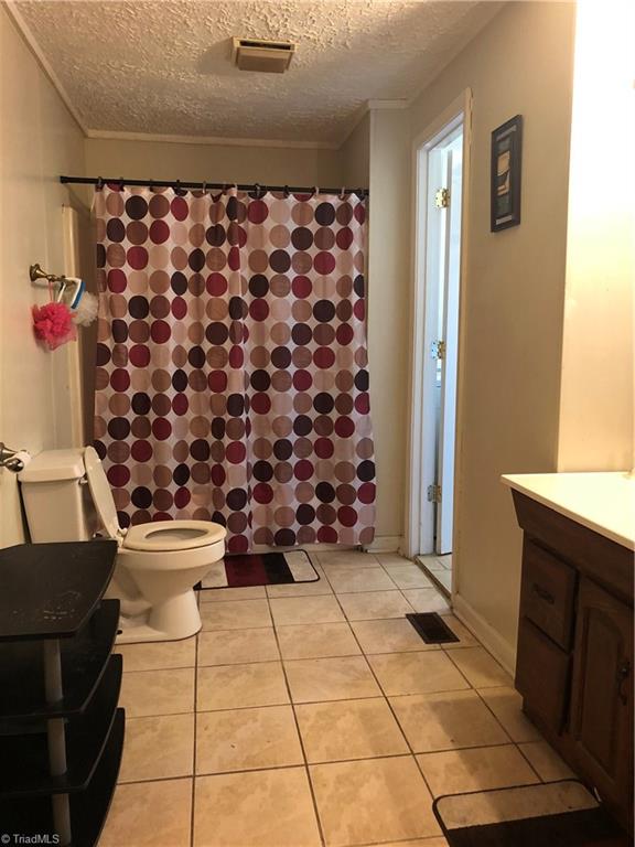 3630 Harvard Road Winston-Salem, NC 27107 - Photo 12 of 16 Decent size full bath with tile floors.