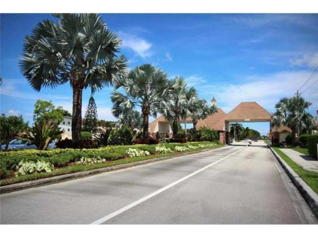 166 Mansfield D Boca Raton, FL 33434 - Photo 7 of 12 CENTURY VILLAGE ENTRANCE