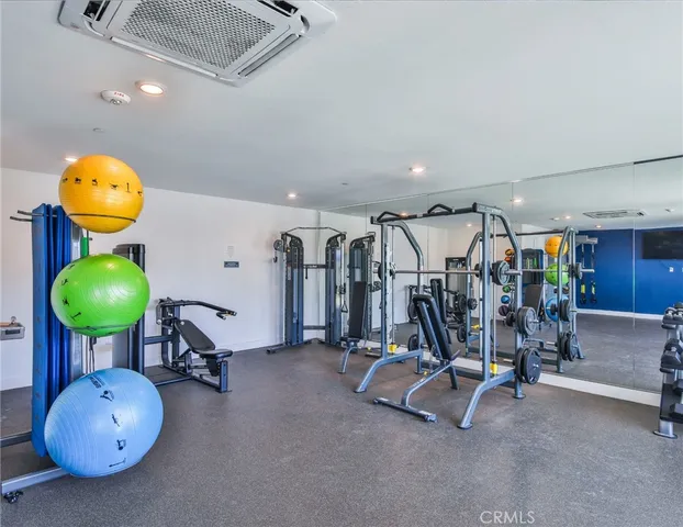 a view of a chairs and table in backyard of the house