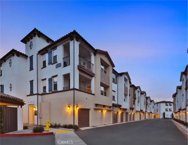 a front view of a building with a street