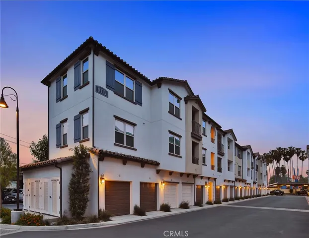 a view of a building with a street