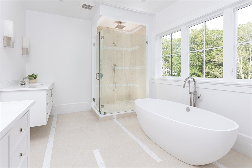68 Clyde Street Brookline, MA 02445 - Photo 17 of 25 a white bath tub sitting next to a white sink