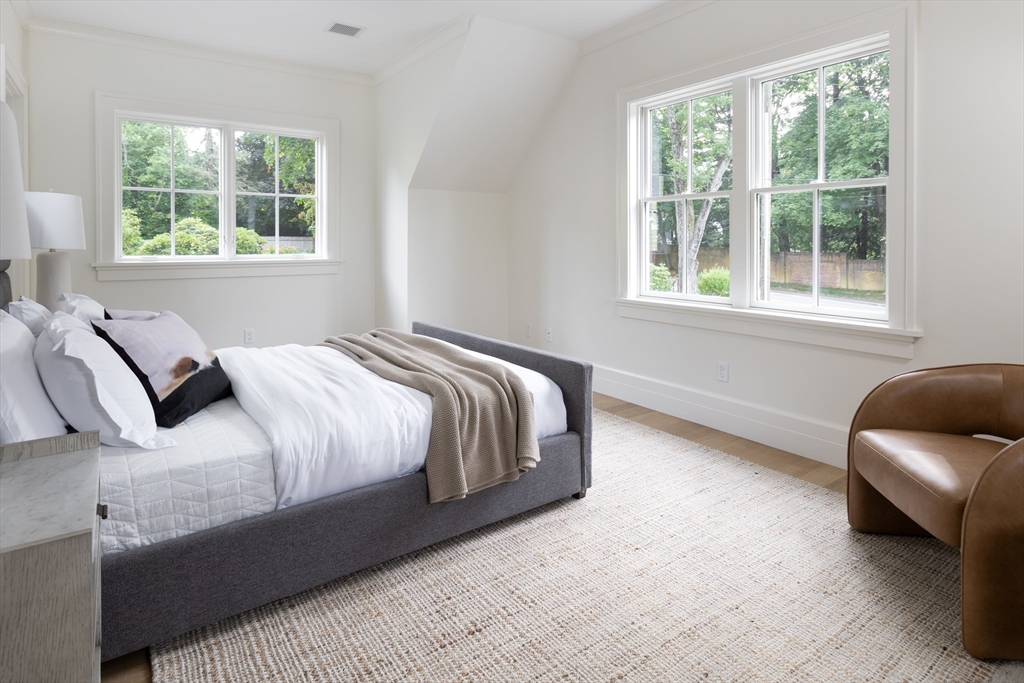 68 Clyde Street Brookline, MA 02445 - Photo 23 of 25 a bedroom with bed and a window