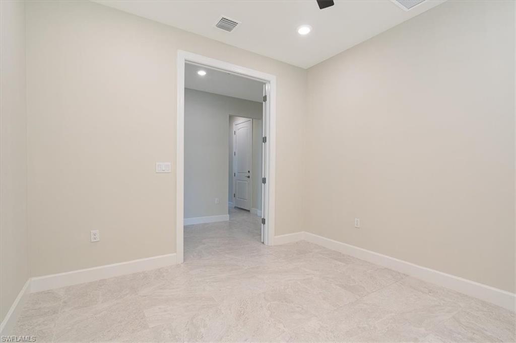 1996 Parson Street Naples, FL 34120 - Photo 13 of 50 Spare room featuring recessed lighting and ceiling fan