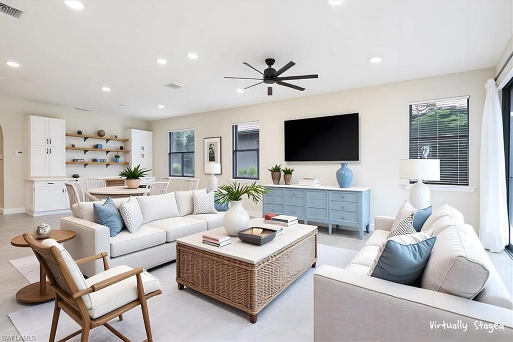 1996 Parson Street Naples, FL 34120 - Photo 24 of 50 Living room featuring recessed lighting and a ceiling fan