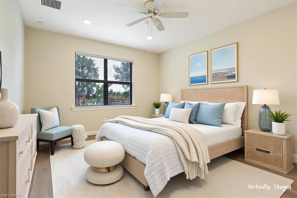 1996 Parson Street Naples, FL 34120 - Photo 28 of 50 Bedroom featuring wood finished floors, a ceiling fan, and recessed lighting
