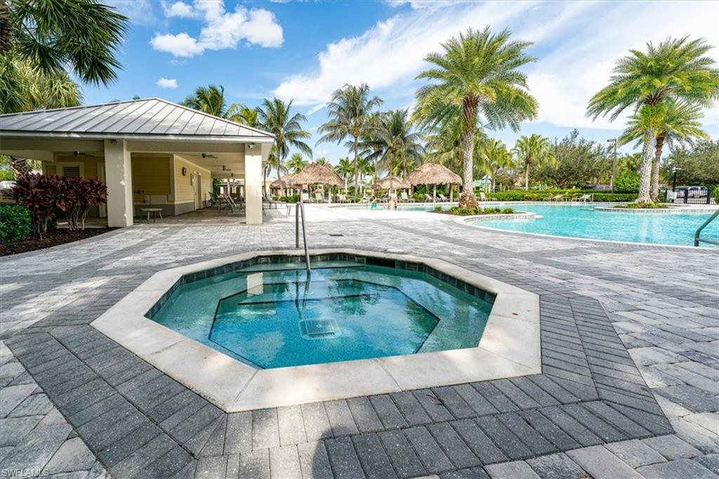 1996 Parson Street Naples, FL 34120 - Photo 45 of 50 Community pool featuring a patio and a hot tub