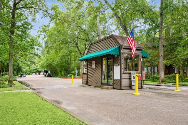 a view of a house with a park