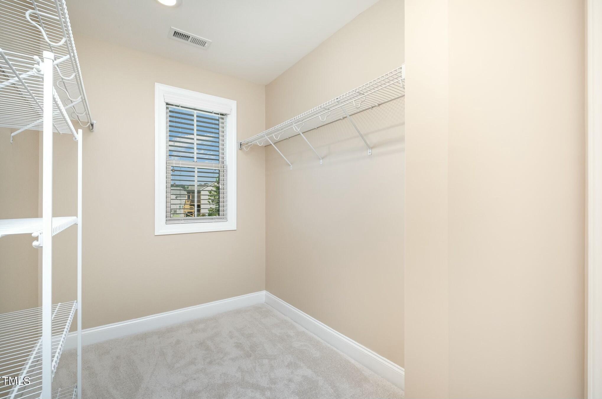 1335 Catch Fly Lane Durham, NC 27713 - Photo 19 of 30 a view of an empty room with a window