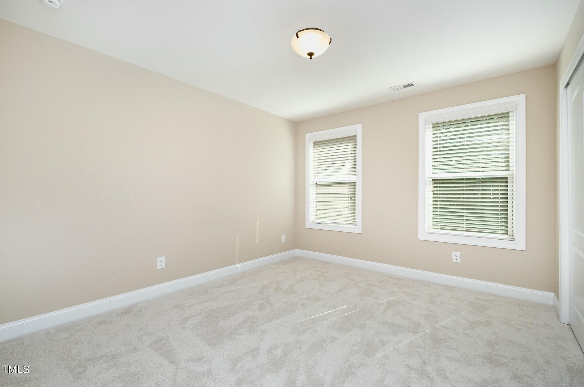 1335 Catch Fly Lane Durham, NC 27713 - Photo 21 of 30 an empty room with a window