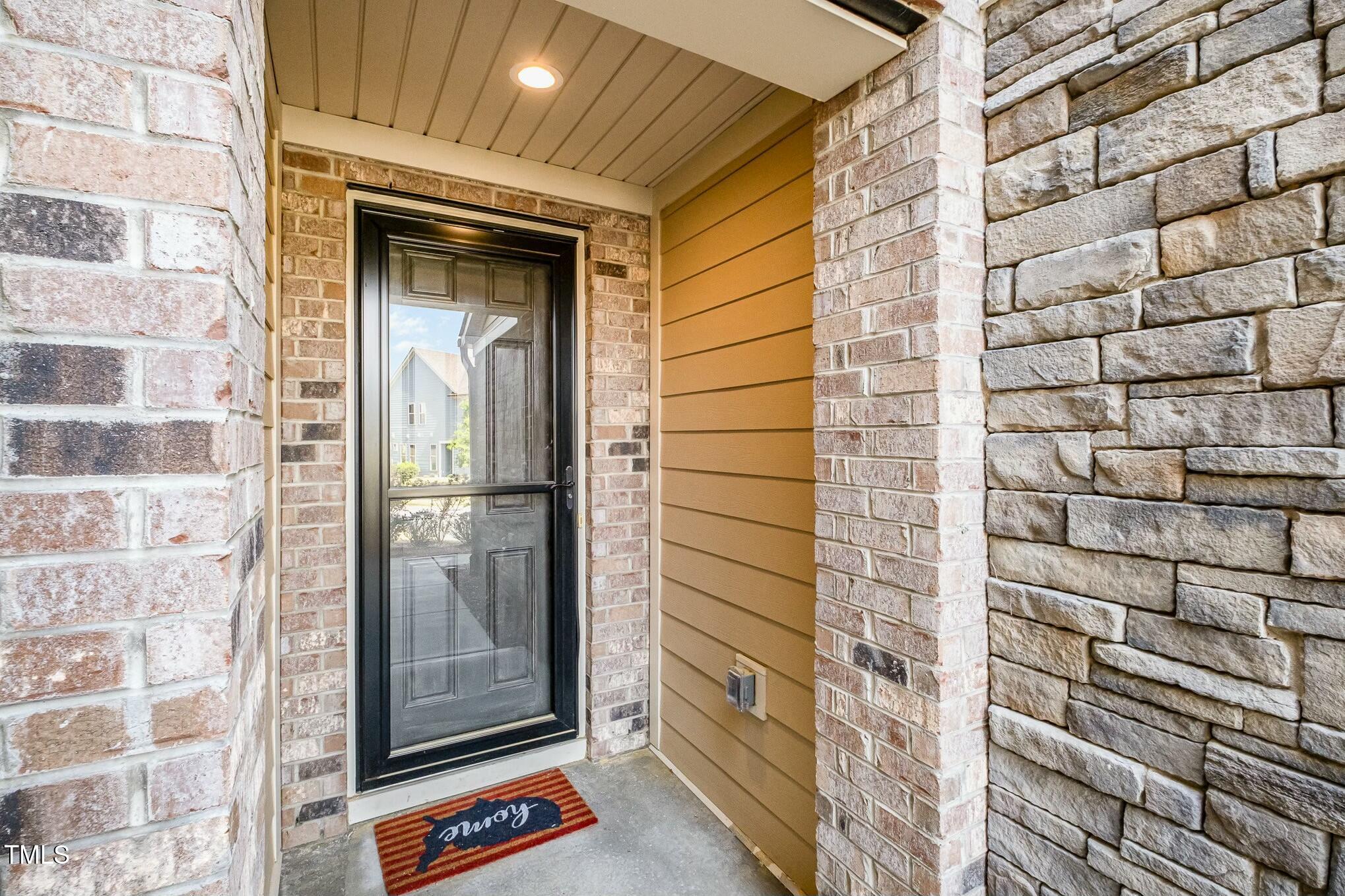 1335 Catch Fly Lane Durham, NC 27713 - Photo 4 of 30 a view of door with a glass door