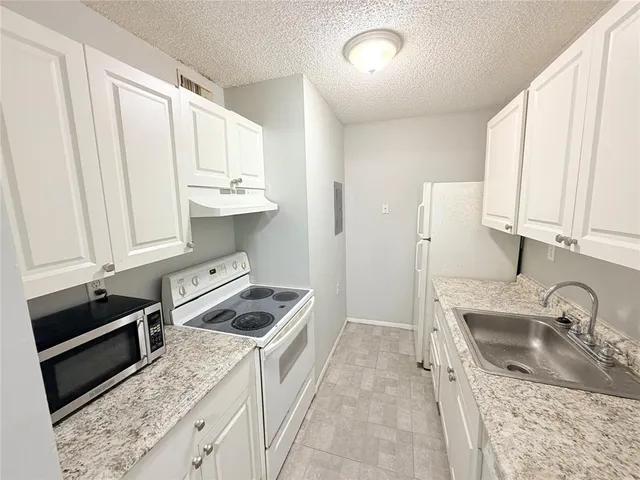 $1,550 | 1167 Benoist Farms Road, Unit 105, West Palm Beach, FL 33411