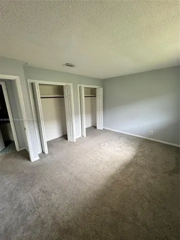 an empty room with a natural light
