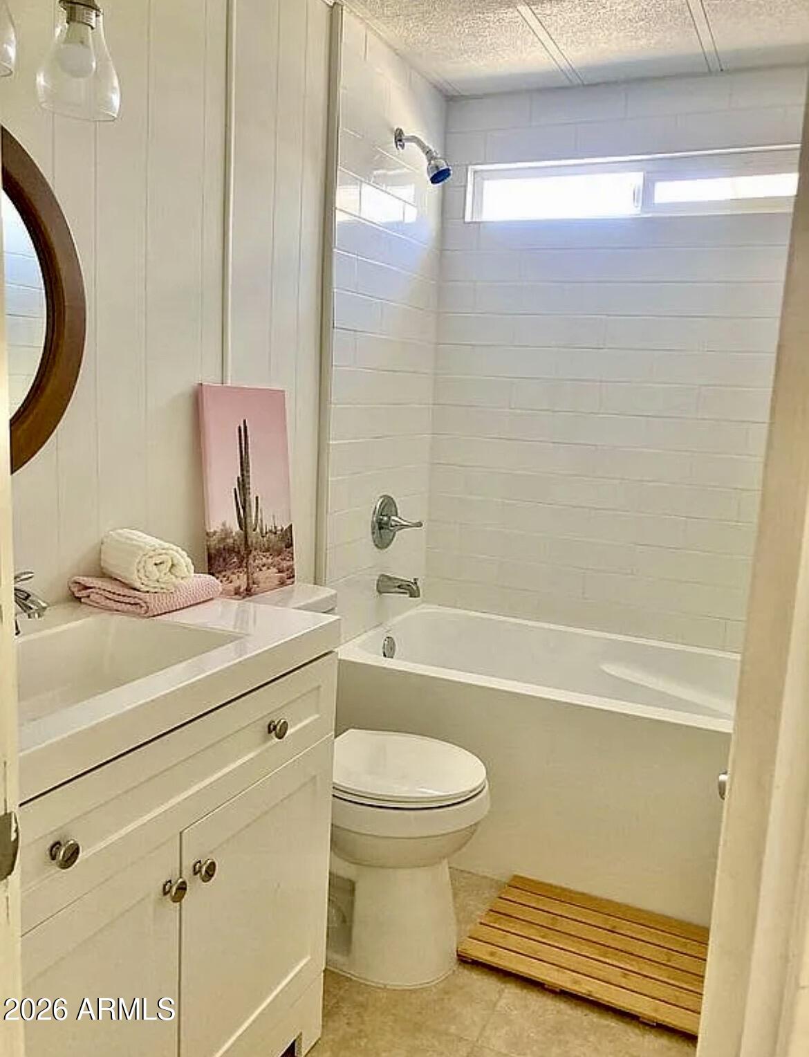 13245 East 39th Way Yuma, AZ 85367 - Photo 11 of 24 a bathroom with a sink a toilet and shower