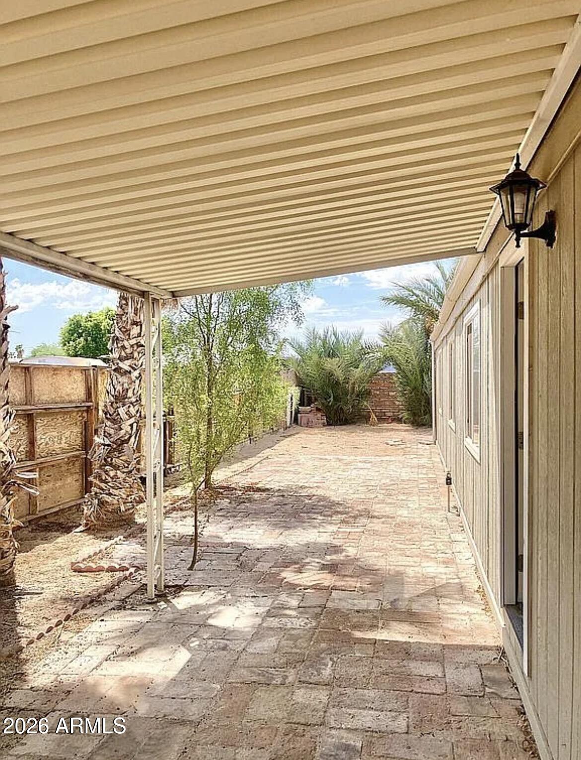 13245 East 39th Way Yuma, AZ 85367 - Photo 14 of 24 a view of a backyard with a patio