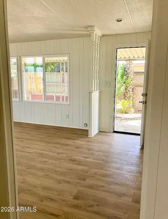 a view of an empty room with a window