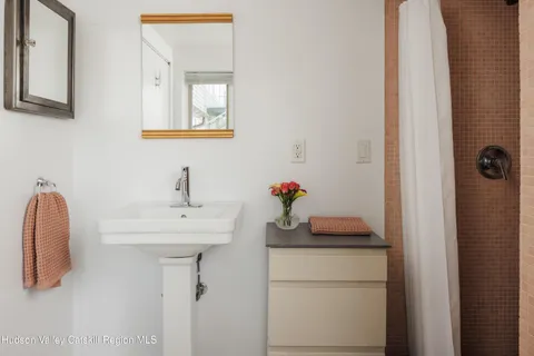 a bedroom with a bed and with furniture