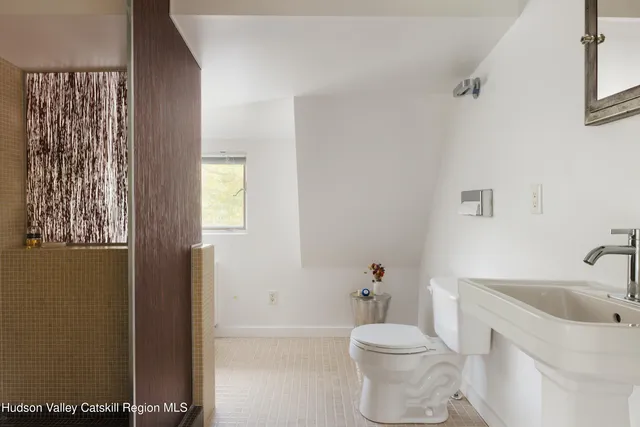 a view of livingroom with furniture and floor to ceiling window