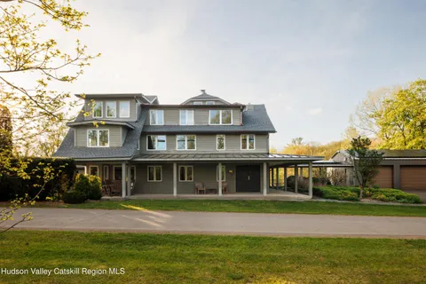 a front view of building with yard