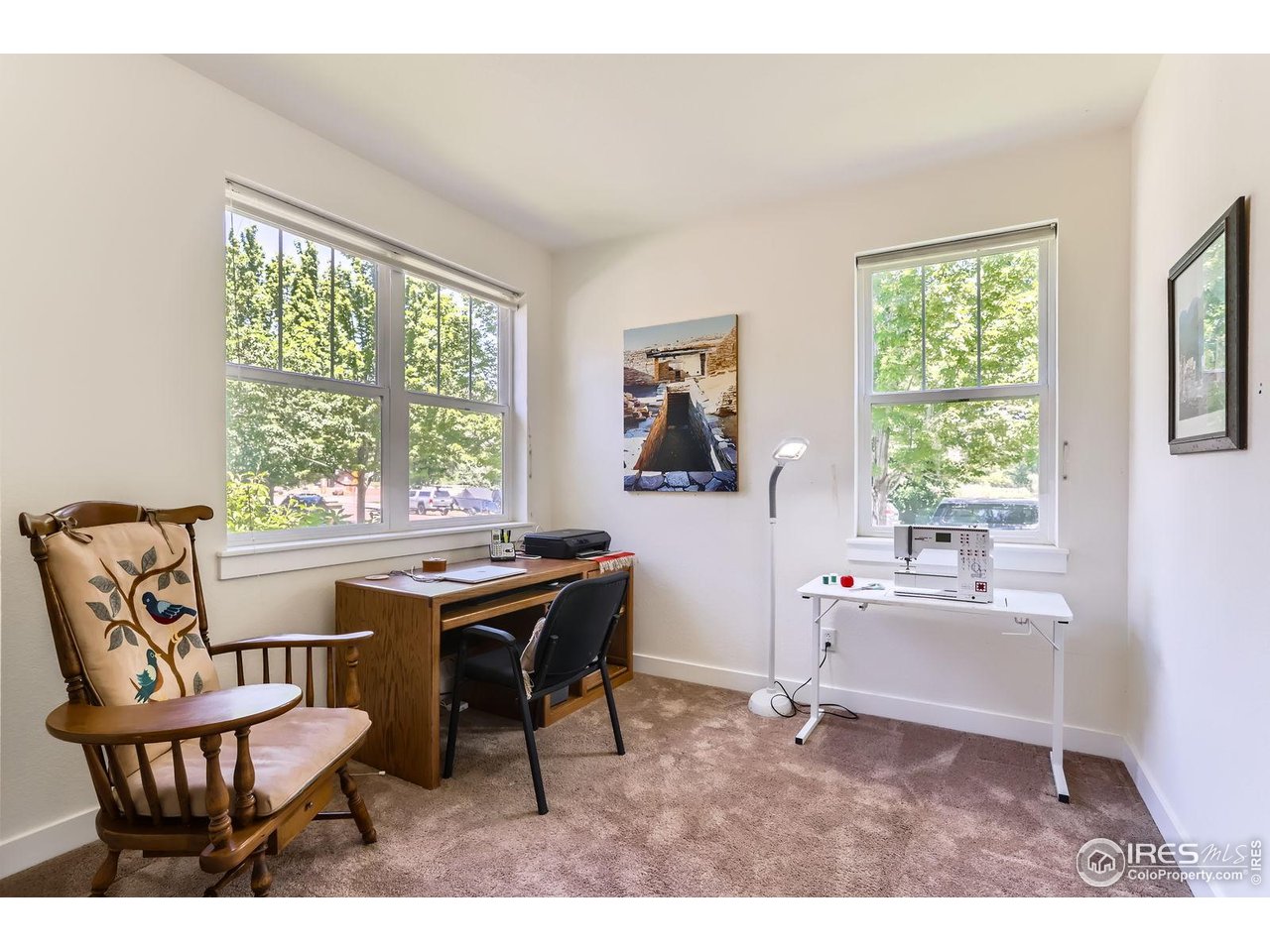 193 2nd Avenue, Unit A Lyons, CO 80540 - Photo 14 of 40 a view of a workspace with furniture and a window