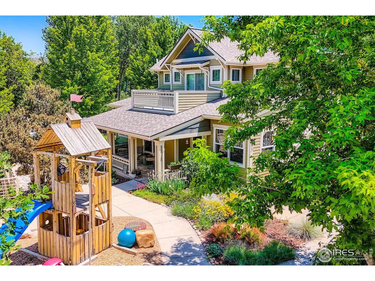193 2nd Avenue, Unit A Lyons, CO 80540 - Photo 17 of 40 a front view of a house with a yard