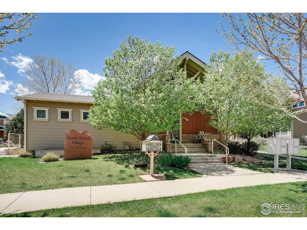 193 2nd Avenue, Unit A Lyons, CO 80540 - Photo 18 of 40 a front view of a house with garden