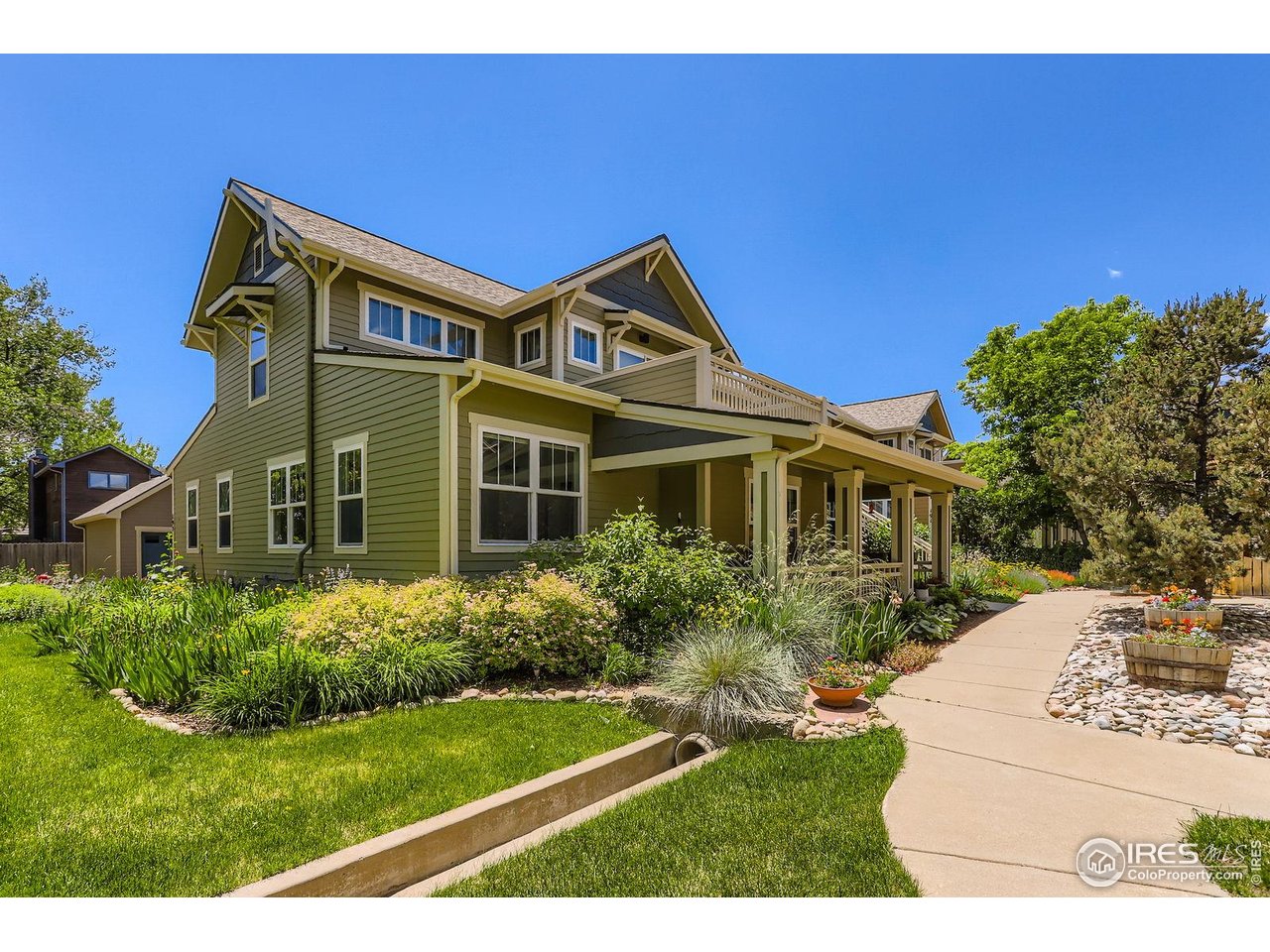 193 2nd Avenue, Unit A Lyons, CO 80540 - Photo 2 of 40 a front view of a house with a yard