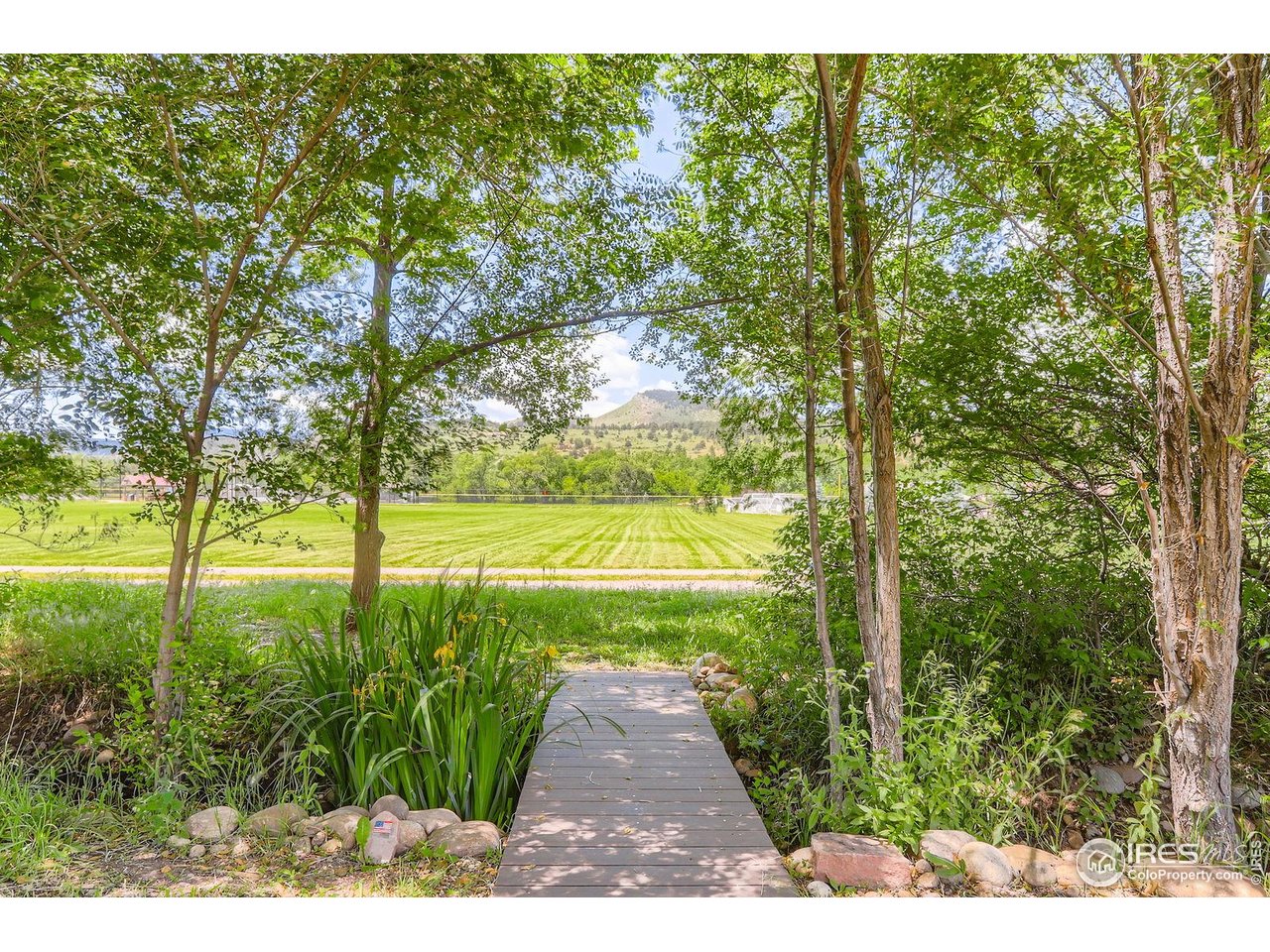 193 2nd Avenue, Unit A Lyons, CO 80540 - Photo 28 of 40 a view of a garden with an outdoor space