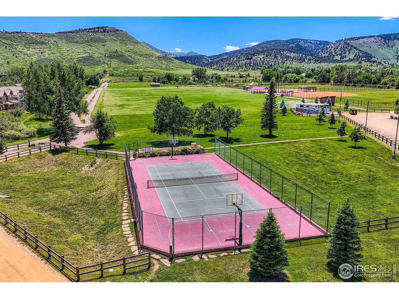 193 2nd Avenue, Unit A Lyons, CO 80540 - Photo 32 of 40 an aerial view of residential houses with outdoor space and lake view