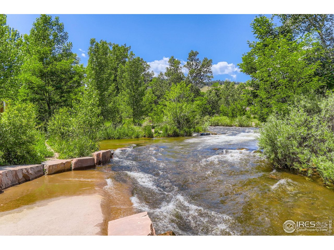 193 2nd Avenue, Unit A Lyons, CO 80540 - Photo 34 of 40 a view of a backyard