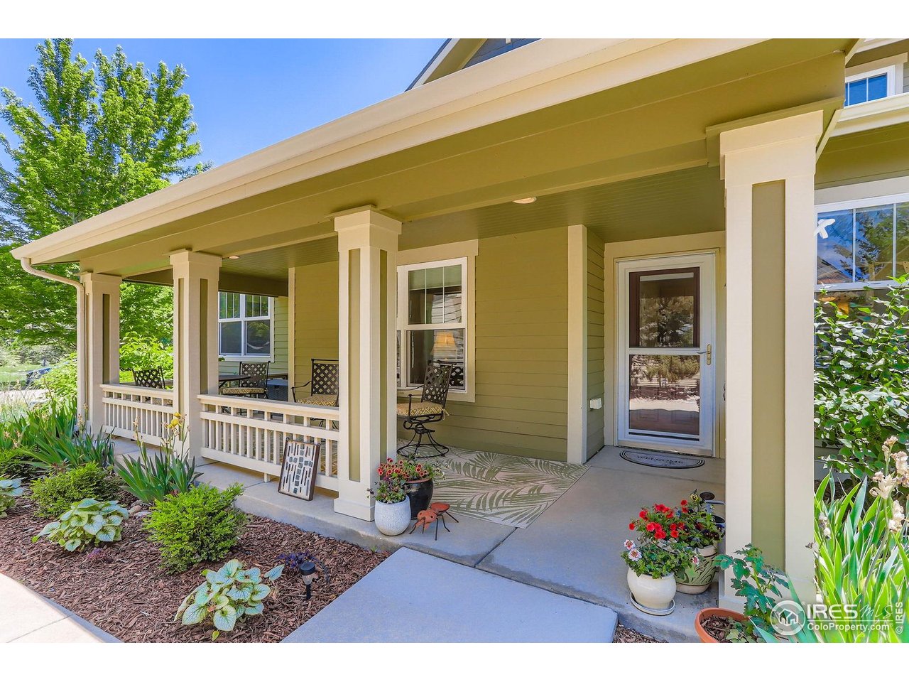193 2nd Avenue, Unit A Lyons, CO 80540 - Photo 6 of 40 a front view of a house with a porch