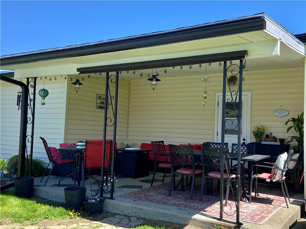 29 Barnes Hill Road Big Flats, NY 14845 - Photo 26 of 39 Covered Patio view 2