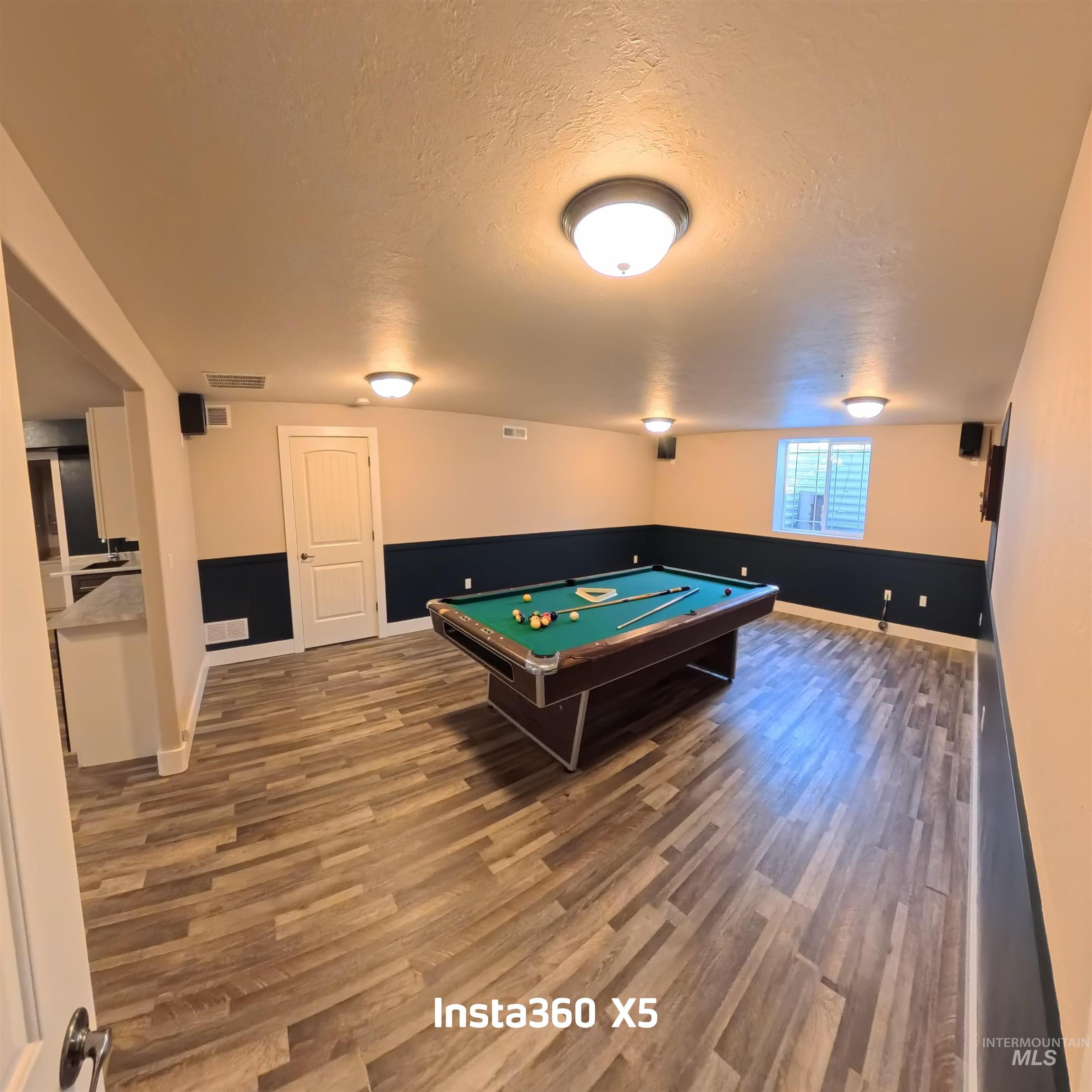 891 North Pointe Drive Twin Falls, ID 83301 - Photo 32 of 46 Game room featuring wood finished floors, a textured ceiling, and billiards