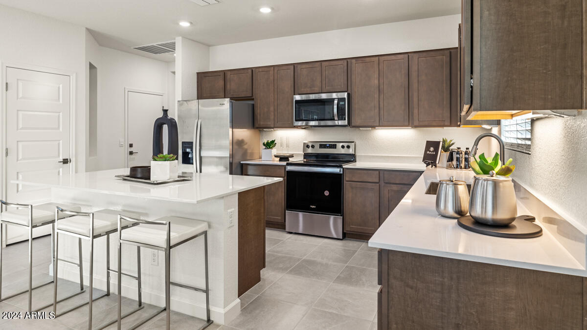 17725 West Hatcher Road Waddell, AZ 85355 - Photo 6 of 24 Kitchen