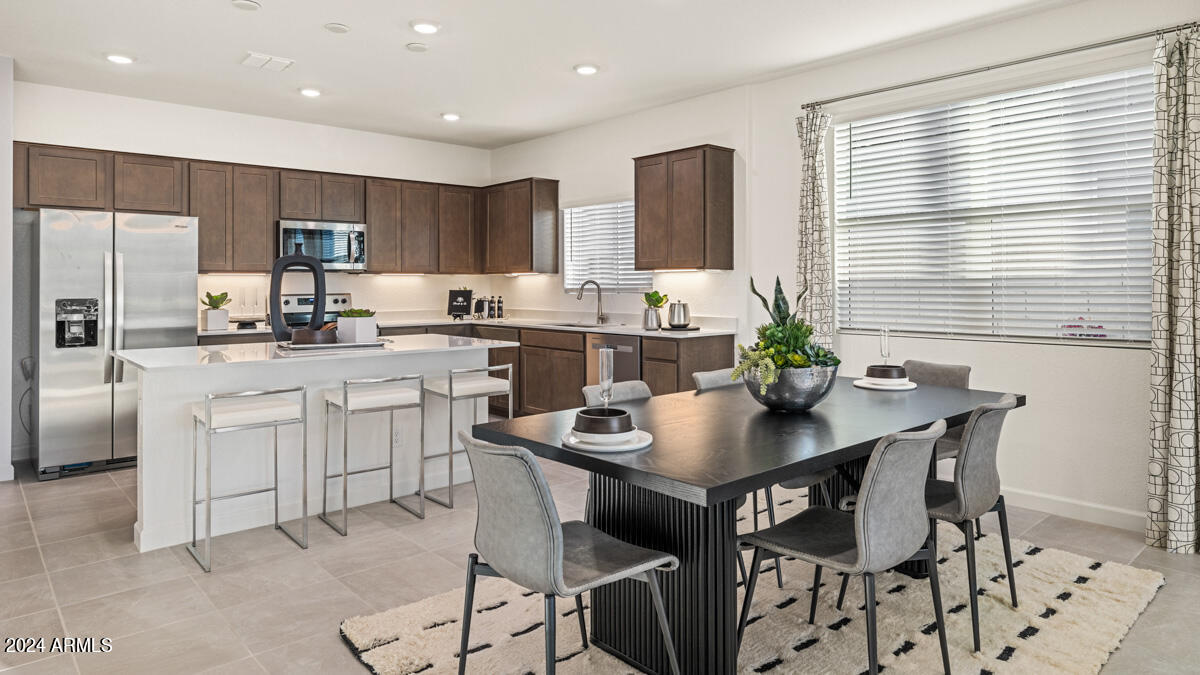 17725 West Hatcher Road Waddell, AZ 85355 - Photo 8 of 24 Kitchen/ Dining