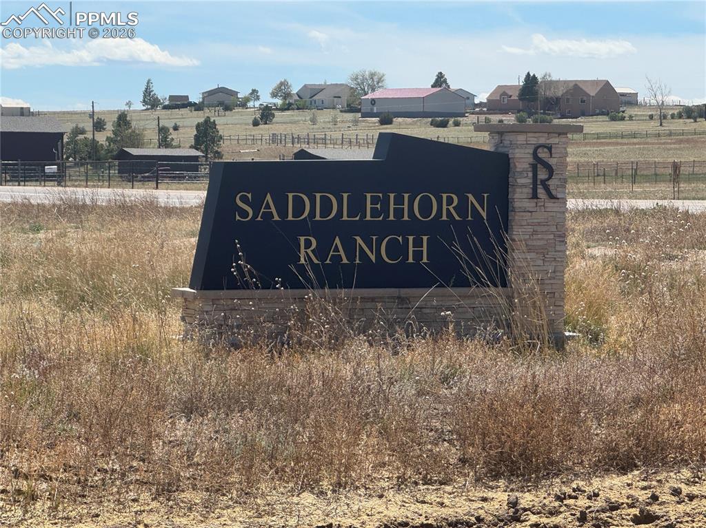 7905 El Raiceno Trail Peyton, CO 80831 - Photo 2 of 7 a view of outdoor space with sign board