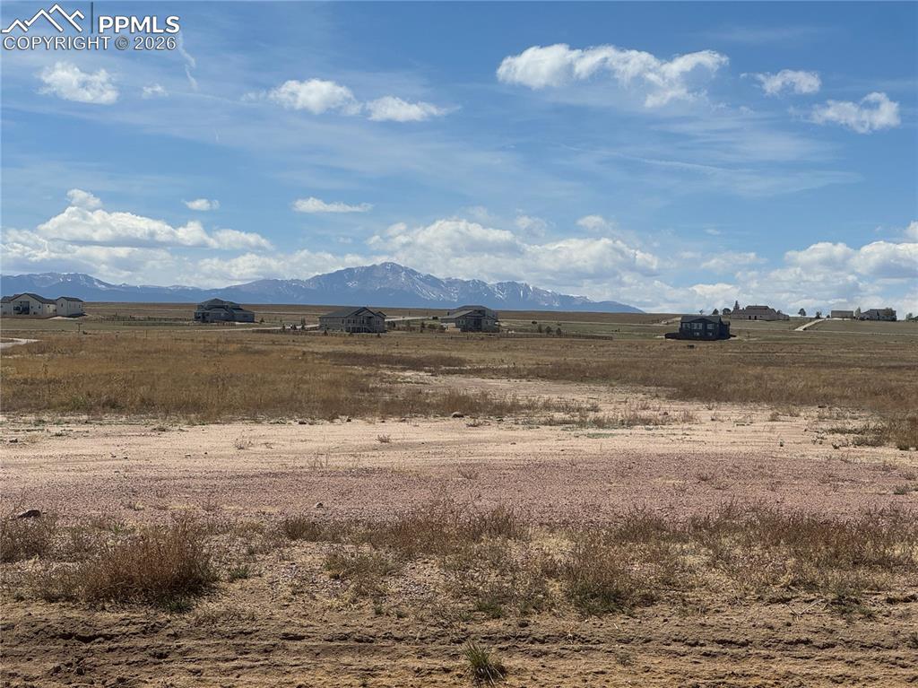 7905 El Raiceno Trail Peyton, CO 80831 - Photo 6 of 7 a view of an ocean and beach