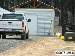 385 Ratliff Gin Road Morven, NC 28119 - Photo 3 of 6 a view of a house with a backyard