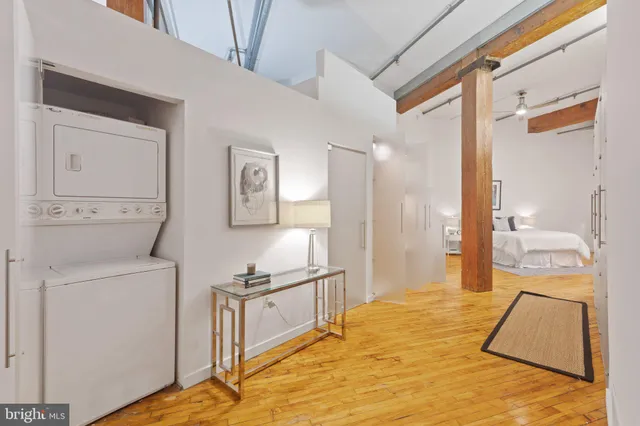 a bedroom with a bed and a view of bathroom