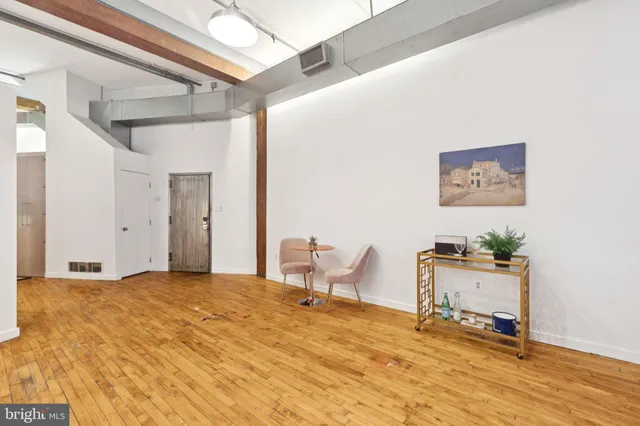 a bedroom with a bed and a cabinets