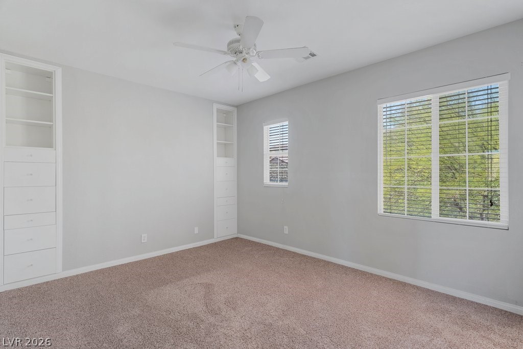 10336 Hawk Ravine Street Las Vegas, NV 89178 - Photo 45 of 59 The other bedroom with access to the Jack-n-Jill Bathroom.