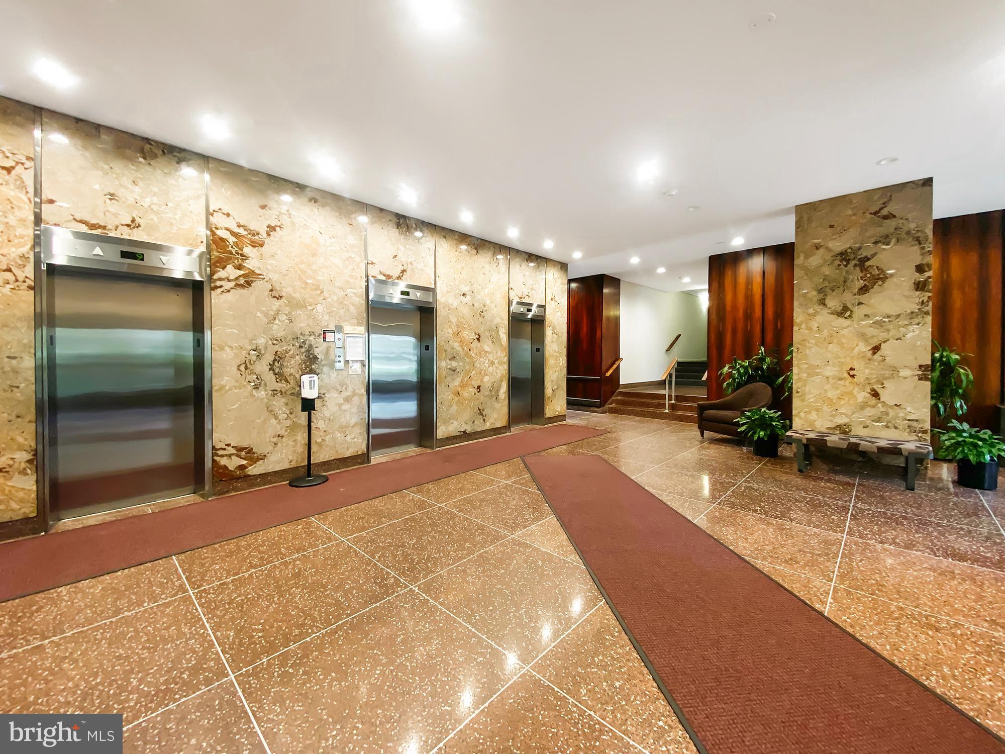 3600 Conshohocken Avenue, Unit 909 Philadelphia, PA 19131 - Photo 16 of 22 a view of a hallway with stairs