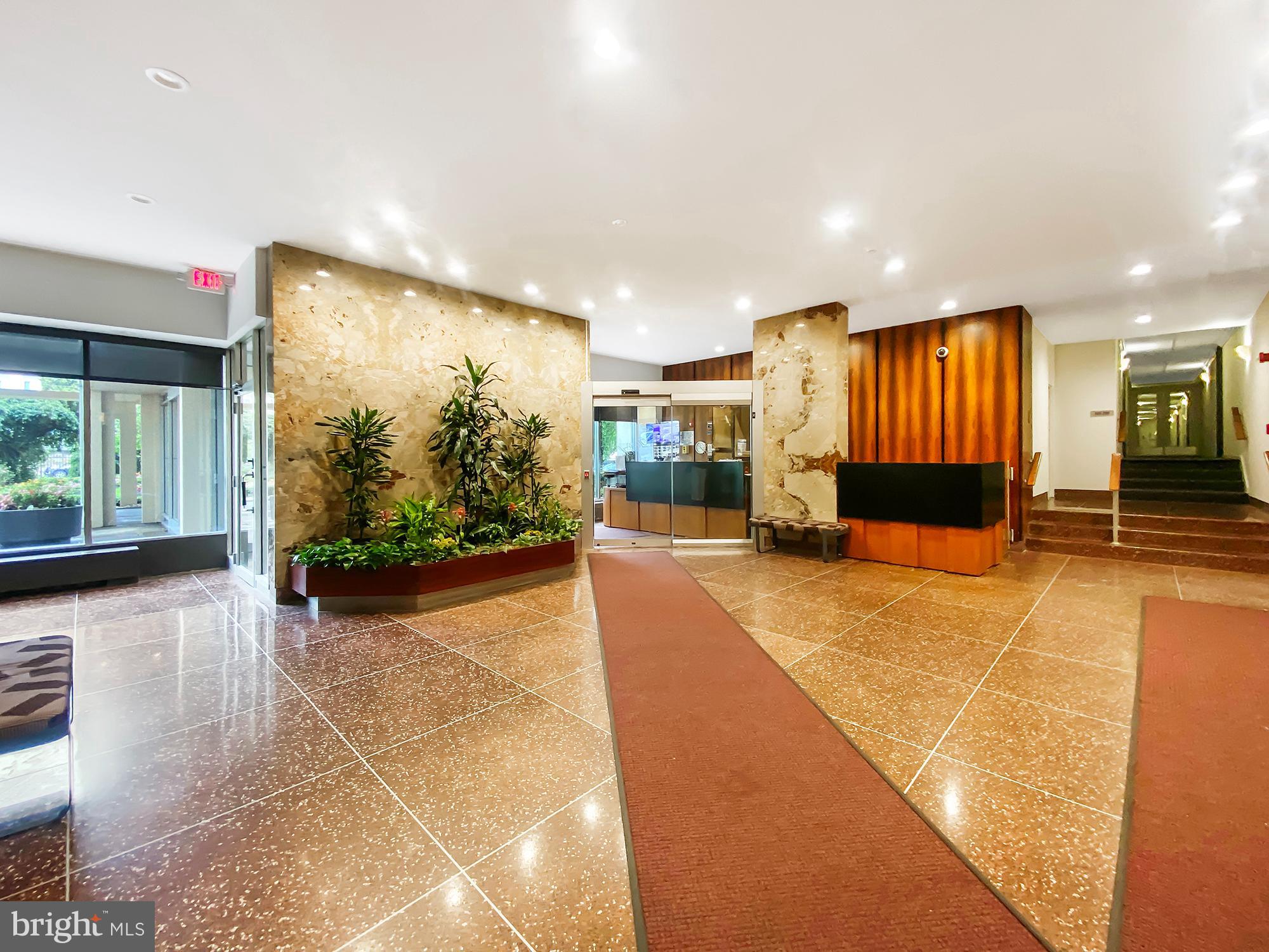 3600 Conshohocken Avenue, Unit 909 Philadelphia, PA 19131 - Photo 18 of 22 a view of a lobby with black carpet