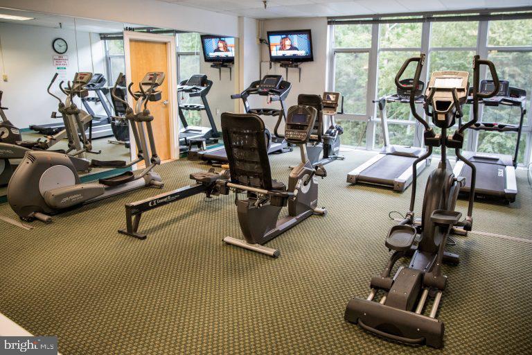 3600 Conshohocken Avenue, Unit 909 Philadelphia, PA 19131 - Photo 21 of 22 a view of a room with gym equipment