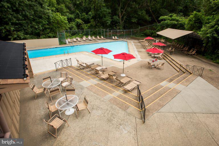 3600 Conshohocken Avenue, Unit 909 Philadelphia, PA 19131 - Photo 22 of 22 an outdoor space with pool and furniture