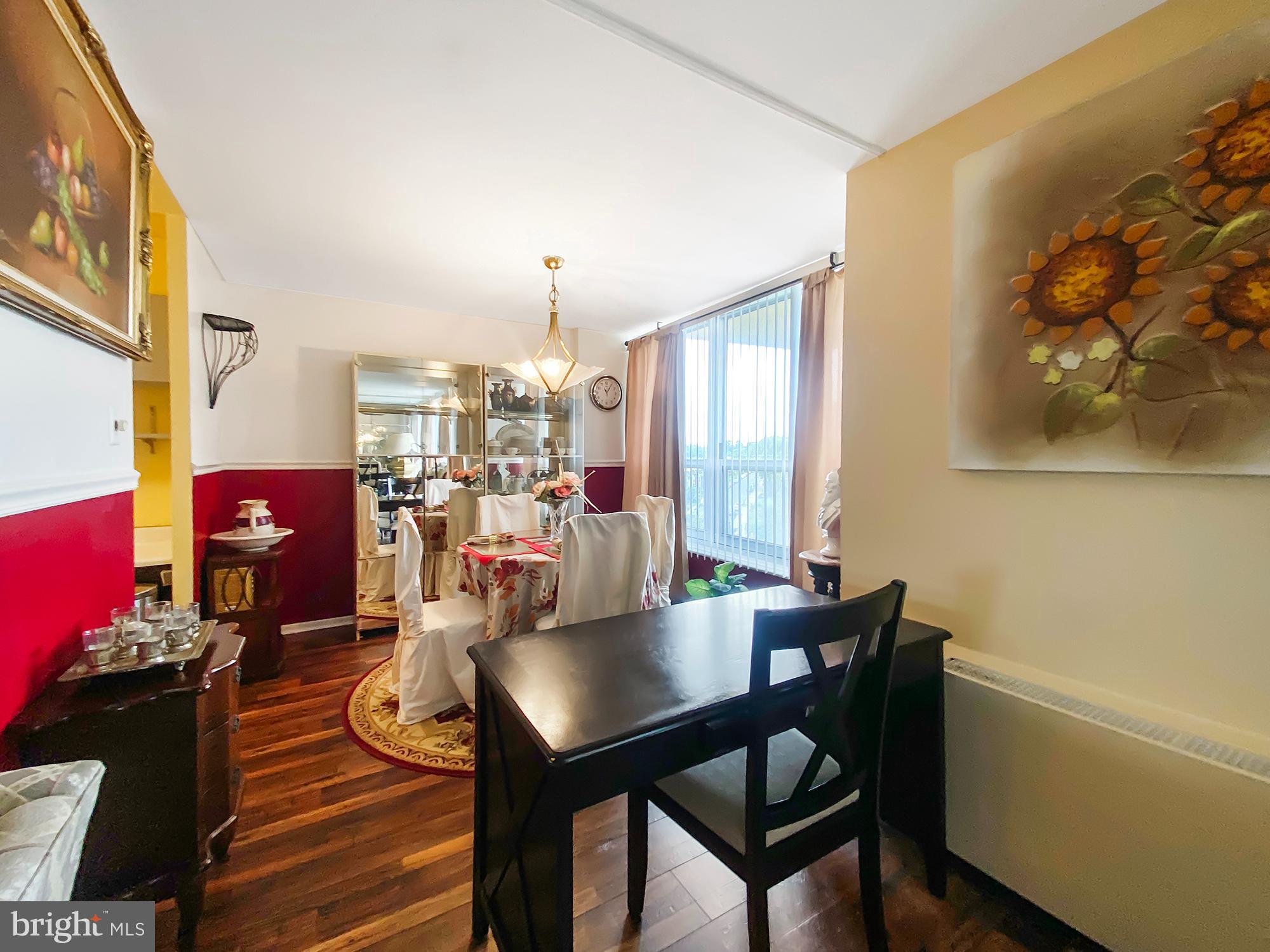 3600 Conshohocken Avenue, Unit 909 Philadelphia, PA 19131 - Photo 9 of 22 a view of a dining room with furniture and a potted plant