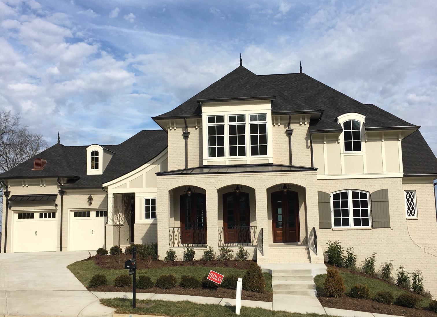 526 Rochester Cl, Unit 1264 Franklin, TN 37064 - Photo 1 of 1 a front view of a house with a yard