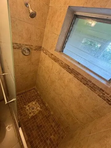 a bathroom with a toilet and a sink