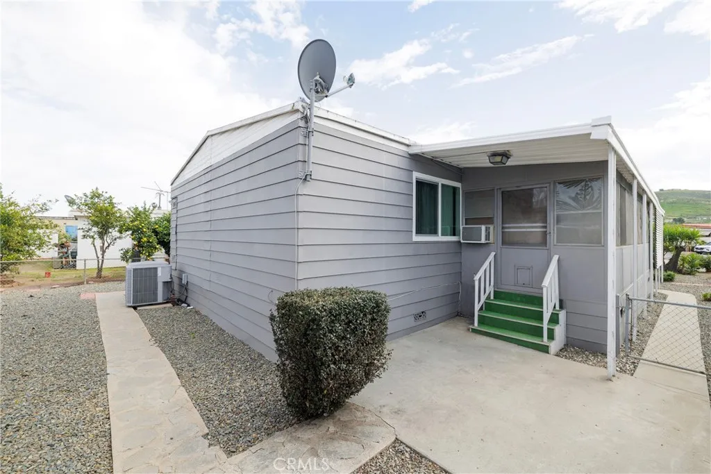 3700 Buchanan Street, Unit 105 Riverside, CA 92503 - Photo 25 of 30 a front view of a house with garden