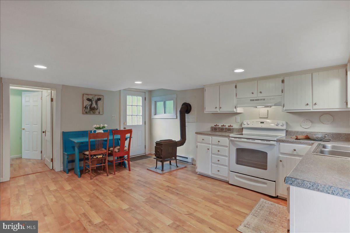 1485 Compton Hollow Road Rileyville, VA 22650 - Photo 15 of 28 Kitchen w/woodstove